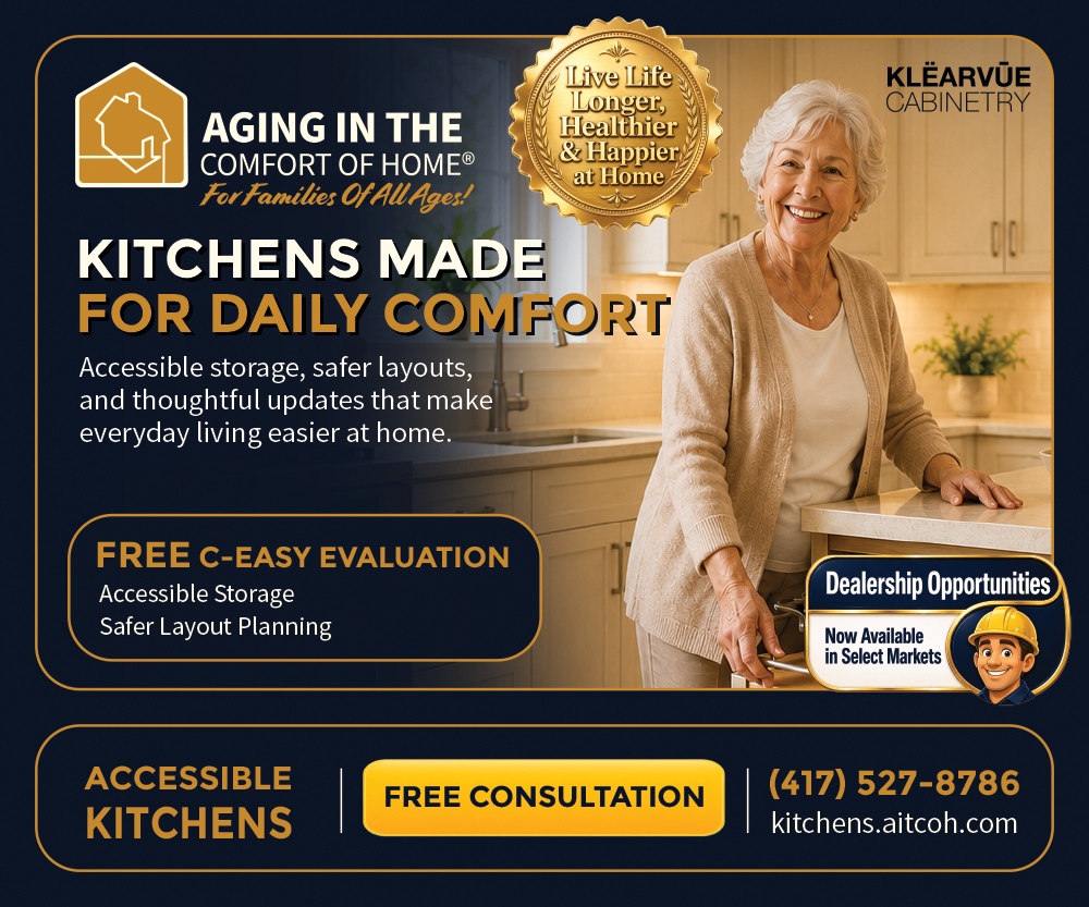 Kitchens campaign ad: Kitchens Made for Daily Comfort. A smiling senior woman opens an accessible drawer in a warm kitchen on a deep navy and gold layout with the KLËARVÜE Cabinetry partner mark, a free C-Easy™ evaluation offer, financing as low as $39.95 per month, and kitchens.aitcoh.com.